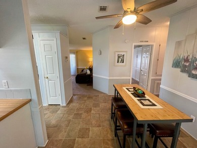 This home comes complete and with a Golf Cart!! Just bring your on Water Oak Country Club Estates in Florida - for sale on GolfHomes.com, golf home, golf lot