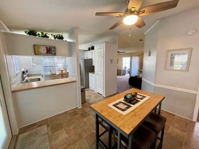 This home comes complete and with a Golf Cart!! Just bring your on Water Oak Country Club Estates in Florida - for sale on GolfHomes.com, golf home, golf lot