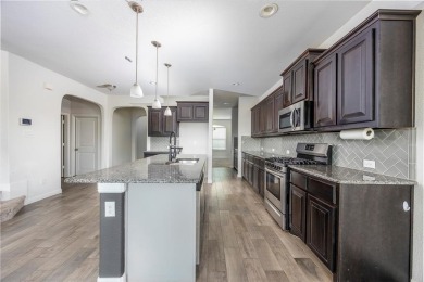 WELCOME HOME! This well-maintained home is located minutes away on The Golf Club At Champions Circle in Texas - for sale on GolfHomes.com, golf home, golf lot