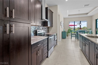 WOW! 2024 Gulf Access Pool Home on a Wide Canal - One Bridge to on Burnt Store Golf Club in Florida - for sale on GolfHomes.com, golf home, golf lot