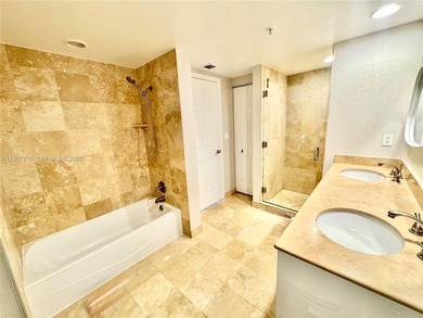 Spacious and inviting 1-bedroom, 1.5-bath residence at DUO on The Diplomat Golf Resort and Spa in Florida - for sale on GolfHomes.com, golf home, golf lot