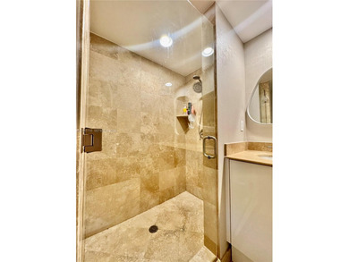 Spacious and inviting 1-bedroom, 1.5-bath residence at DUO on The Diplomat Golf Resort and Spa in Florida - for sale on GolfHomes.com, golf home, golf lot