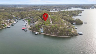 Seize the opportunity to build your dream lakeside retreat on on The Club At Porto Cima in Missouri - for sale on GolfHomes.com, golf home, golf lot