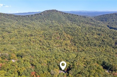 Nestled in the heart of the breathtaking Big Canoe mountain on Big Canoe Golf Club - Cherokee in Georgia - for sale on GolfHomes.com, golf home, golf lot
