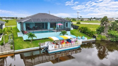 WOW! 2024 Gulf Access Pool Home on a Wide Canal - One Bridge to on Burnt Store Golf Club in Florida - for sale on GolfHomes.com, golf home, golf lot