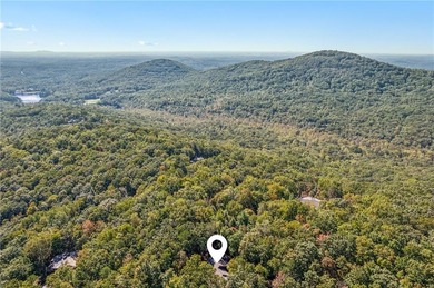 Nestled in the heart of the breathtaking Big Canoe mountain on Big Canoe Golf Club - Cherokee in Georgia - for sale on GolfHomes.com, golf home, golf lot