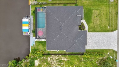 WOW! 2024 Gulf Access Pool Home on a Wide Canal - One Bridge to on Burnt Store Golf Club in Florida - for sale on GolfHomes.com, golf home, golf lot