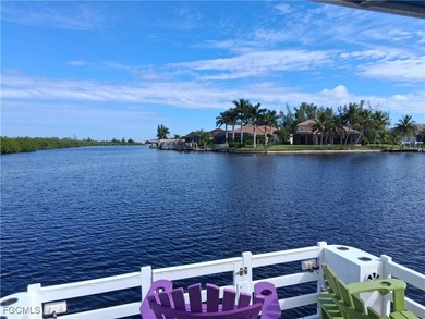 WOW! 2024 Gulf Access Pool Home on a Wide Canal - One Bridge to on Burnt Store Golf Club in Florida - for sale on GolfHomes.com, golf home, golf lot