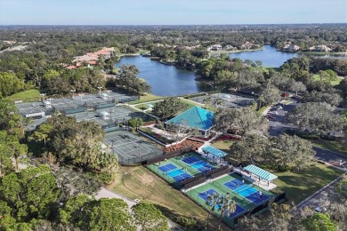 Discover the perfect blend of comfort, style, and outdoor living on University Park Country Club in Florida - for sale on GolfHomes.com, golf home, golf lot