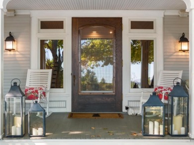 Built on a spacious scenic lot on the north side of Downtown on Charlevoix Golf Club in Michigan - for sale on GolfHomes.com, golf home, golf lot