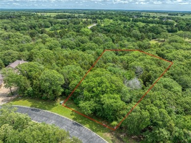 Discover the perfect blend of luxury and nature with this prime on Rock Creek Golf Club in Texas - for sale on GolfHomes.com, golf home, golf lot