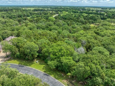 Discover the perfect blend of luxury and nature with this prime on Rock Creek Golf Club in Texas - for sale on GolfHomes.com, golf home, golf lot