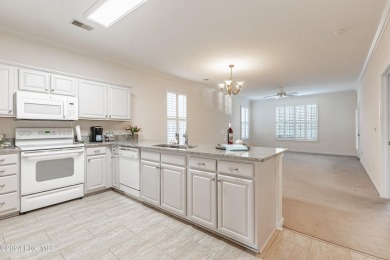 Located on the ground floor, this 3 bedroom, 2 bath is your on Sandpiper Bay Golf and Country Club in North Carolina - for sale on GolfHomes.com, golf home, golf lot