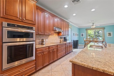This beautiful DUNWOODY floor plan is located on the 2nd fairway on Panther Run Golf Club in Florida - for sale on GolfHomes.com, golf home, golf lot