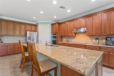 This beautiful DUNWOODY floor plan is located on the 2nd fairway on Panther Run Golf Club in Florida - for sale on GolfHomes.com, golf home, golf lot