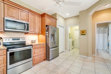 Welcome to your dream villa in Pelican Pointe Golf & Country on Pelican Pointe Golf and Country Club in Florida - for sale on GolfHomes.com, golf home, golf lot