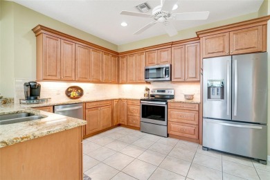 Welcome to your dream villa in Pelican Pointe Golf & Country on Pelican Pointe Golf and Country Club in Florida - for sale on GolfHomes.com, golf home, golf lot