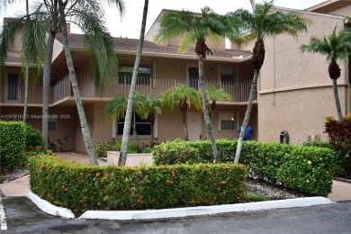 Spacious 2/2 on ground floor with views to the well maintained on Woodmont Country Club in Florida - for sale on GolfHomes.com, golf home, golf lot