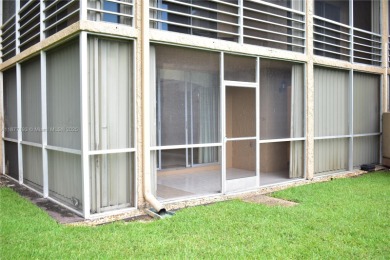 Spacious 2/2 on ground floor with views to the well maintained on Woodmont Country Club in Florida - for sale on GolfHomes.com, golf home, golf lot