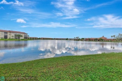 Enjoy the spectacular LAKE view from this beautiful 2/2 located on Flamingo Lakes Country Club in Florida - for sale on GolfHomes.com, golf home, golf lot