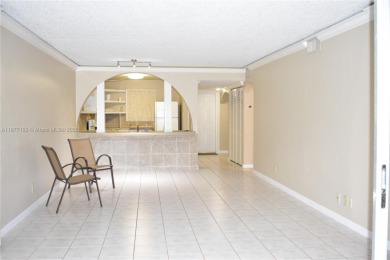 Spacious 2/2 on ground floor with views to the well maintained on Woodmont Country Club in Florida - for sale on GolfHomes.com, golf home, golf lot