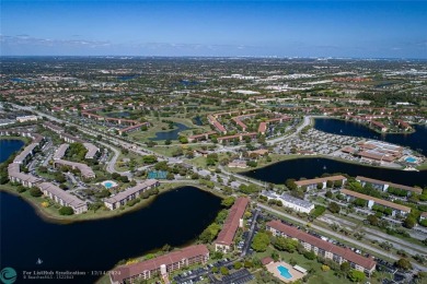 Enjoy the spectacular LAKE view from this beautiful 2/2 located on Flamingo Lakes Country Club in Florida - for sale on GolfHomes.com, golf home, golf lot