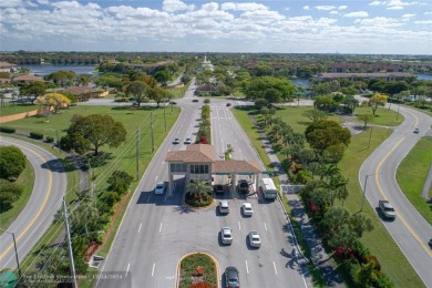 Enjoy the spectacular LAKE view from this beautiful 2/2 located on Flamingo Lakes Country Club in Florida - for sale on GolfHomes.com, golf home, golf lot