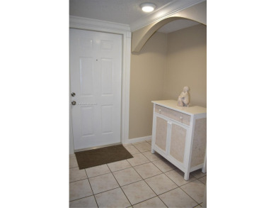 Spacious 2/2 on ground floor with views to the well maintained on Woodmont Country Club in Florida - for sale on GolfHomes.com, golf home, golf lot