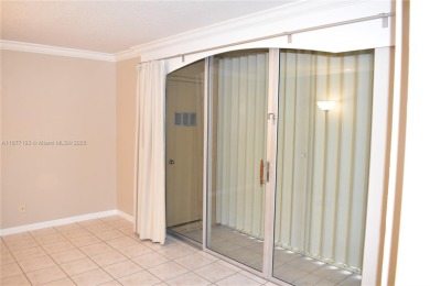 Spacious 2/2 on ground floor with views to the well maintained on Woodmont Country Club in Florida - for sale on GolfHomes.com, golf home, golf lot