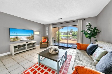Wake up to shimmering lake views and the quiet calm of Bluewater on Golf Club at Bluewater Bay Resort in Florida - for sale on GolfHomes.com, golf home, golf lot
