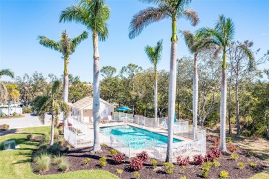 Welcome to your dream villa in Pelican Pointe Golf & Country on Pelican Pointe Golf and Country Club in Florida - for sale on GolfHomes.com, golf home, golf lot