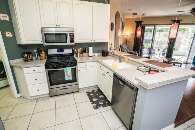 Your Perfect retirement maintenance free condo, sits on a large on Scepter Golf Club in Florida - for sale on GolfHomes.com, golf home, golf lot