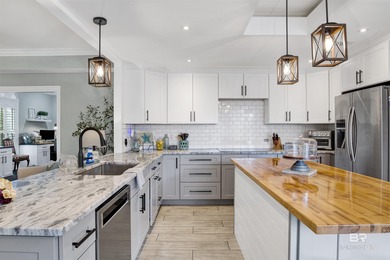 Welcome to this expansive 6-bedroom, 4.5-bath home perfectly on The Golf Club of the Wharf in Alabama - for sale on GolfHomes.com, golf home, golf lot