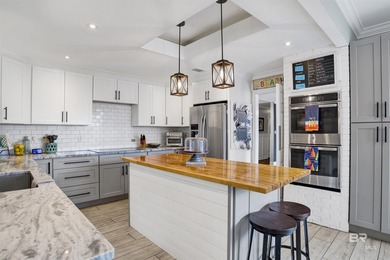 Welcome to this expansive 6-bedroom, 4.5-bath home perfectly on The Golf Club of the Wharf in Alabama - for sale on GolfHomes.com, golf home, golf lot