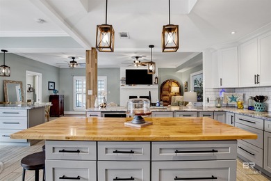 Welcome to this expansive 6-bedroom, 4.5-bath home perfectly on The Golf Club of the Wharf in Alabama - for sale on GolfHomes.com, golf home, golf lot