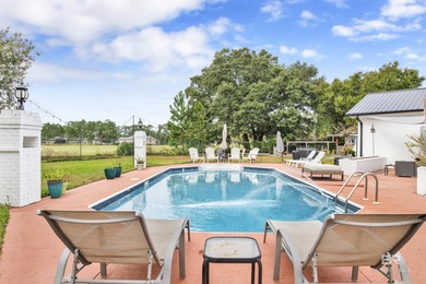 Welcome to this expansive 6-bedroom, 4.5-bath home perfectly on The Golf Club of the Wharf in Alabama - for sale on GolfHomes.com, golf home, golf lot