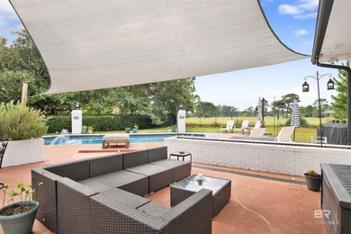 Welcome to this expansive 6-bedroom, 4.5-bath home perfectly on The Golf Club of the Wharf in Alabama - for sale on GolfHomes.com, golf home, golf lot