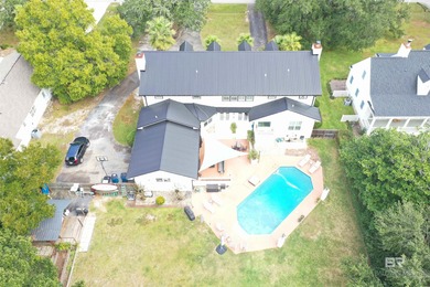 Welcome to this expansive 6-bedroom, 4.5-bath home perfectly on The Golf Club of the Wharf in Alabama - for sale on GolfHomes.com, golf home, golf lot