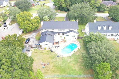 Welcome to this expansive 6-bedroom, 4.5-bath home perfectly on The Golf Club of the Wharf in Alabama - for sale on GolfHomes.com, golf home, golf lot