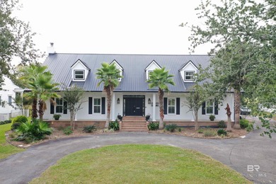 Welcome to this expansive 6-bedroom, 4.5-bath home perfectly on The Golf Club of the Wharf in Alabama - for sale on GolfHomes.com, golf home, golf lot