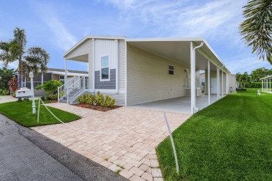 LIGHT & BRIGHT OPEN DESIGN WITH HIGH CEILINGS AND IDEAL FOR on Royal Wood Golf and Country Club in Florida - for sale on GolfHomes.com, golf home, golf lot