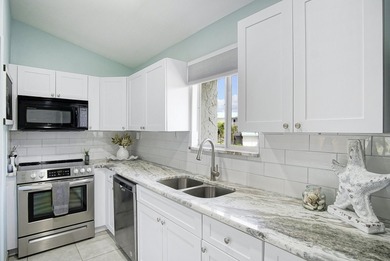 Gorgeous 2 bed, 2 bath, 2nd floor condo overlooking the 8th on Ocean Village Golf Course in Florida - for sale on GolfHomes.com, golf home, golf lot