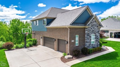 Welcome to this beautifully maintained 4-bedroom, 2.5-bathroom on Boulder Pointe Golf Club and Conference Center in Michigan - for sale on GolfHomes.com, golf home, golf lot