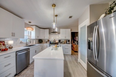 This beautifully updated 1,744 sq. ft. home is located in the on Pine Lakes Country Club in Florida - for sale on GolfHomes.com, golf home, golf lot