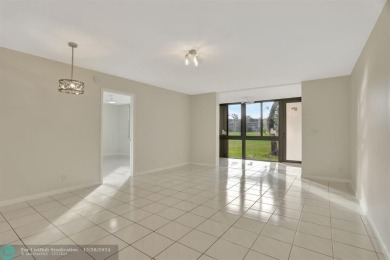 Discover this beautiful 2-bedroom, 2-bathroom gem in Palm on Oriole Golf and Tennis Club in Florida - for sale on GolfHomes.com, golf home, golf lot