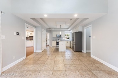 Welcome to this stunning 3,115-square-foot home perfectly on North Shore Country Club in North Carolina - for sale on GolfHomes.com, golf home, golf lot