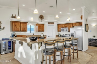 Architectural Excellence Meets Unmatched Lake Views! Welcome to on The Refuge Golf and Country Club in Arizona - for sale on GolfHomes.com, golf home, golf lot