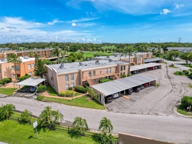 Discover this charming two-bedroom, two-bathroom condo in the on East Bay Golf Club in Florida - for sale on GolfHomes.com, golf home, golf lot