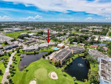 Discover this charming two-bedroom, two-bathroom condo in the on East Bay Golf Club in Florida - for sale on GolfHomes.com, golf home, golf lot