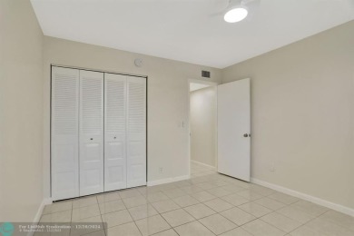 Discover this beautiful 2-bedroom, 2-bathroom gem in Palm on Oriole Golf and Tennis Club in Florida - for sale on GolfHomes.com, golf home, golf lot